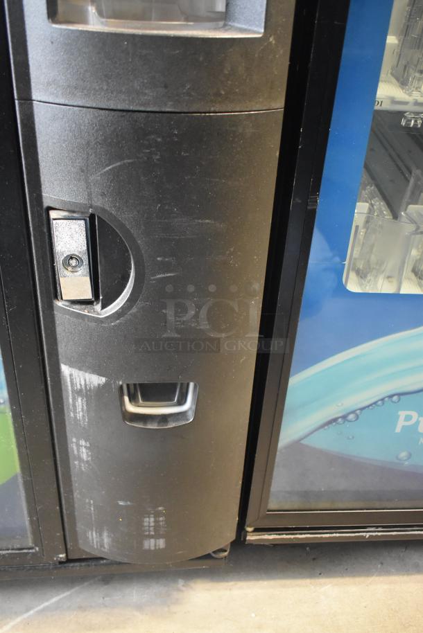 Crane 5800-4 metal commercial vending machine, bill acceptor, 115 volts, 1 phase, visible scuffs on exterior.