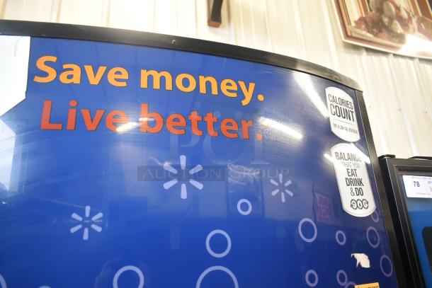 Metal commercial vending machine with bill acceptor, blue display with "Save money. Live better." 115 Volts, 1 Phase.