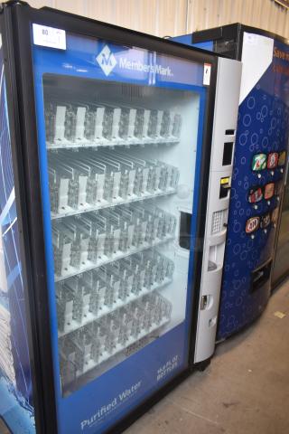 Crane 5800-4 metal commercial bottled drink vending machine with bill acceptor, 115 volts, 1 phase, labeled "Members Mark."