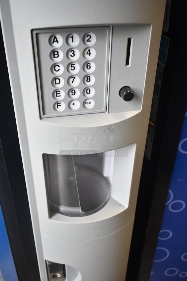 Crane 5800-4 metal drink vending machine with keypad and bill acceptor, 115 volts, 1 phase, commercial use.