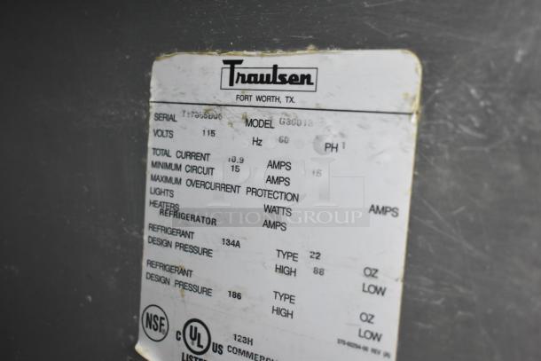 Traulsen G30013 commercial cooler label, indicating 115 volts, 1 phase, 134A refrigerant, NSF and UL listed.