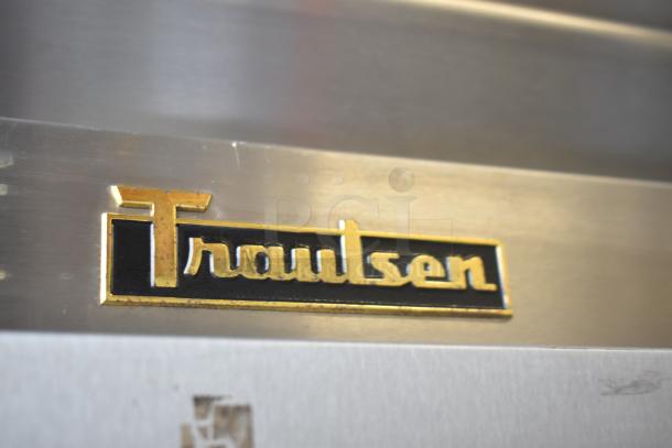 Traulsen ALT132WUT-FHS commercial reach-in freezer, 115V, stainless steel, single door, on casters; visible Traulsen logo.
