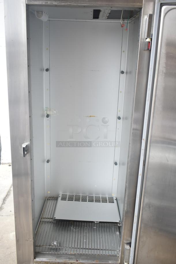 Traulsen ALT132WUT-FHS commercial single door reach-in freezer on casters, stainless steel, 115V, 1 phase, clean interior.