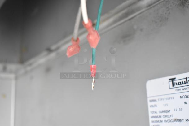 Traulsen ALT132WUT-FHS commercial freezer interior showing wiring and model label. 115 volts, 1 phase.