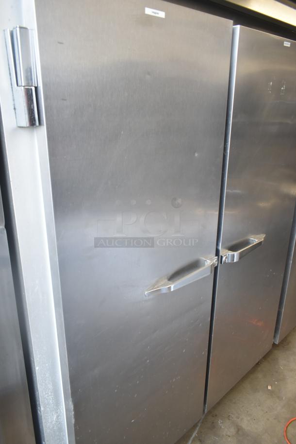 McCall 4-4070 commercial 3-door reach-in cooler, stainless steel, 115 volts, 1 phase, visible markings, sturdy handles.
