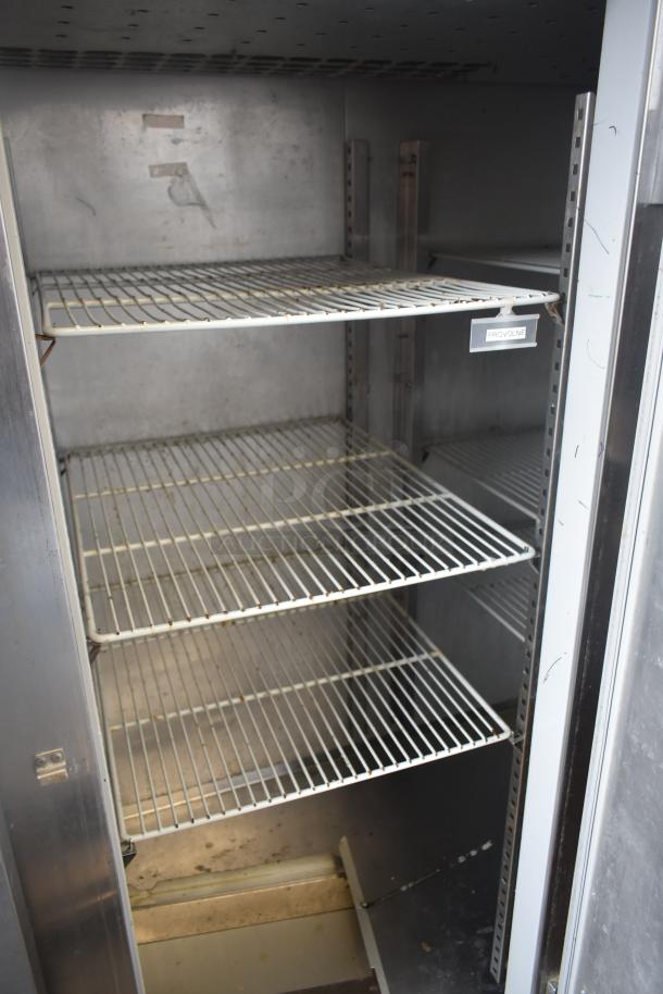 McCall 4-4070 Commercial 3-Door Reach-In Cooler, 115V, 1 Phase. Features spacious interior and five metal shelves.