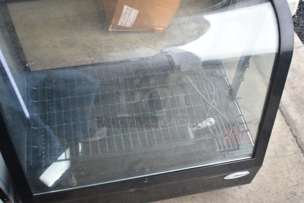 KoolMore CDC-3C-BK countertop display refrigerator, 3.6 cu ft, features front glass display, black exterior, minor dust visible.