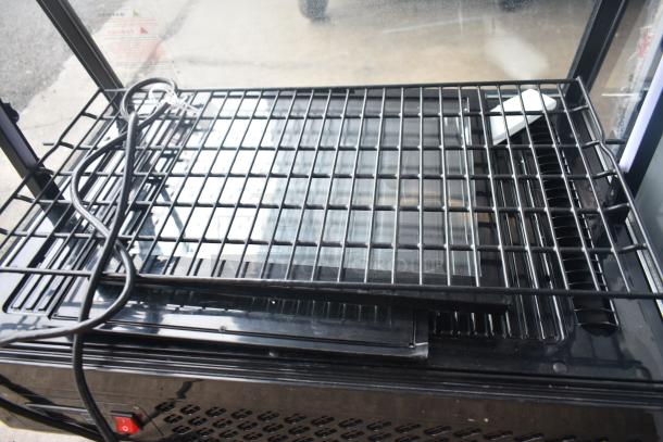 KoolMore CDC-3C-BK countertop display refrigerator, 3.6 cu ft, black grid shelf, power cord visible, excellent condition.