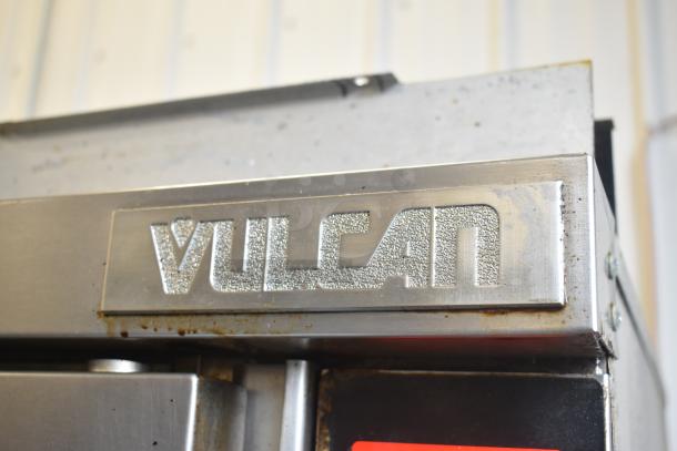Vulcan VC5GD-11D1Z commercial convection oven badge, showing metallic logo on the unit's exterior.