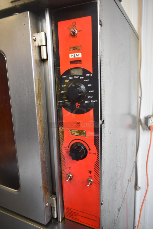 Vulcan VC5GD-11D1Z convection oven control panel with thermostatic controls, temperature settings, and operational switches.