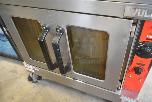 2 Vulcan VC5GD-11D1Z commercial convection ovens with view-through doors and thermostatic controls on casters.