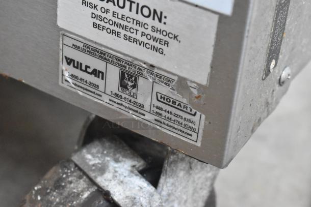 Vulcan VC5GD-11D1Z convection oven label with brand logos, caution warning, and service contact information.