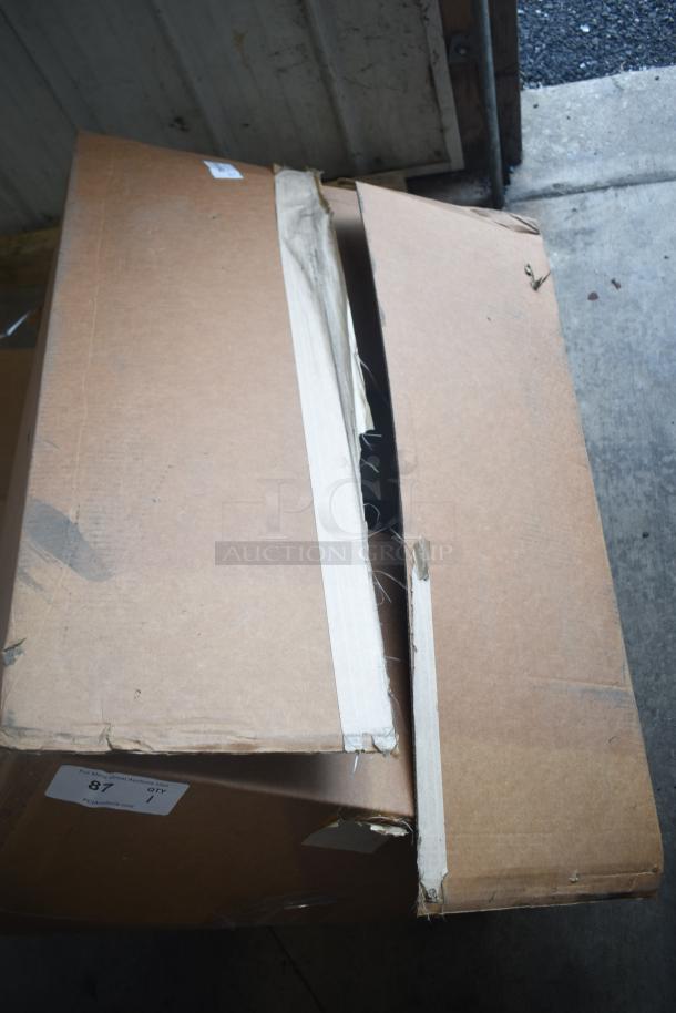 Brand new De Shaw Unit 12-00123-01-MOD_A00 in damaged box with visible dents and tape. Tags indicate new condition.