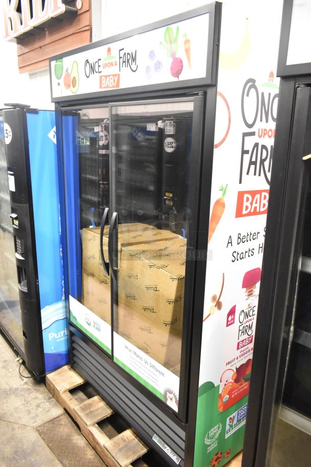 Brand new 2025 True TVM-48SL-HC commercial 2-door cooler merchandiser with "Scratch and Dent" condition. 115V, 1 Phase.