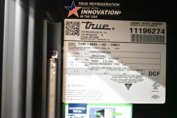 BRAND NEW 2025 True TVM-48SL-HC 2 Door Reach In Cooler, 115V, 1 Phase, Scratch and Dent condition. Serial number label shown.