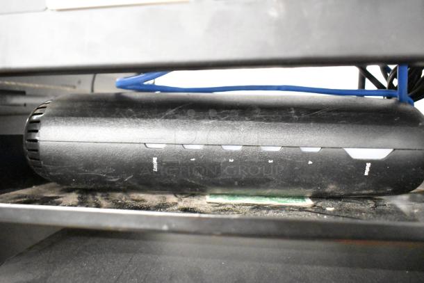 AV cabinet with Pyle PCI-800 power conditioner, Lowell rack unit, modem, HPE OfficeConnect switch J9980A, and other AV equipment.