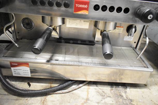 Torrie MTE225XC70 commercial espresso machine, 2 group, with 2 portafilters and steam wands, in used condition.