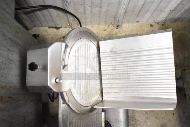 Avantco 177SL312 commercial meat slicer with built-in blade sharpener, visible wear, 115V, 1 Phase, countertop model.