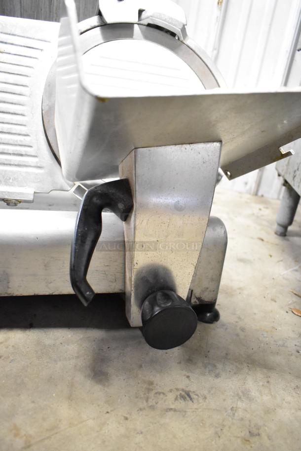 Avantco 177SL312 commercial meat slicer with blade sharpener, 115 Volts, 1 Phase, shown in used condition.