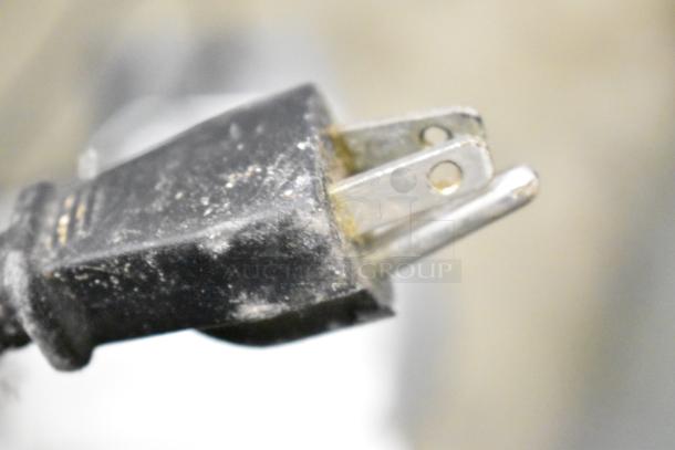 Plug for Avantco 177SL312 Commercial Meat Slicer, showing standard 115V, 1 Phase connection. Plug appears slightly worn.