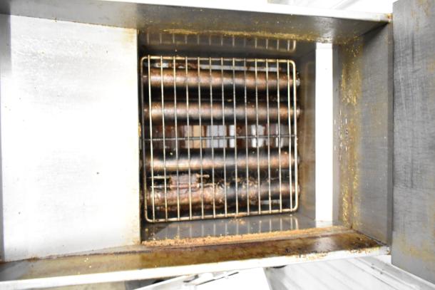 2023 Pitco Frialator 40D deep fat fryer, natural gas, 107,000 BTU, with 2 fry baskets. Interior view shows heating elements.