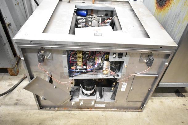 2021 Ice-O-Matic ICE1506HT2 Commercial Ice Head, 208-230V, 1 Phase. Internal components visible, durable stainless steel.