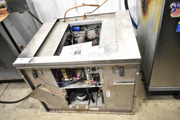 2021 Ice-O-Matic ICE1506HT2 commercial ice head, 208-230V, 1 phase, open panel showing internal components, good condition.