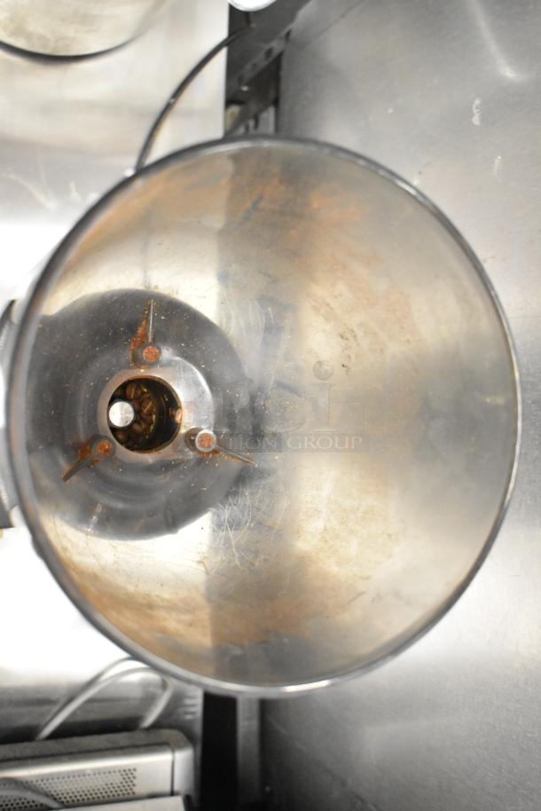 2017 Torrie Moinho D64-E-PR-D espresso grinder, 115 volts, 1 phase. Stainless steel, visible bean residue in hopper.