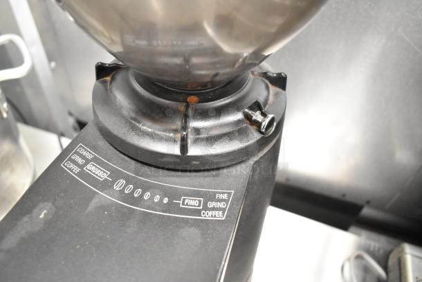 2017 Torrie Moinho D64-E-PR-D commercial espresso grinder, 115V, with adjustable grind settings, in used condition.