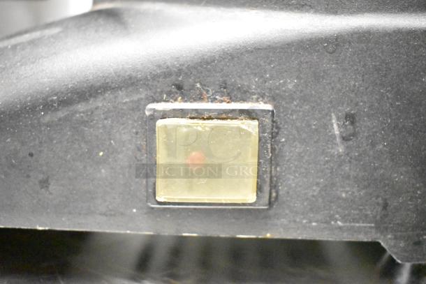 2017 Torrie Moinho D64-E-PR-D espresso bean grinder, visible wear near a square button, 115V, 1 phase.