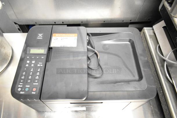 Canon K10546 multifunction printer in good condition, features keypad, LCD display, and power cords. Includes cost-saving sticker.