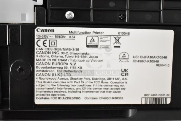 Canon K10546 Multifunction Printer label showing model details, power specs, and compliance certifications.