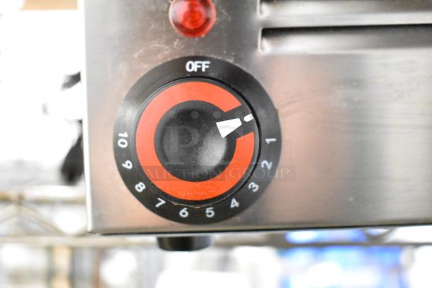 2025 Adcraft FW-1200W Commercial Food Warmer control dial. Features adjustable temperature settings.