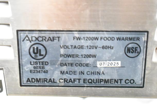 Adcraft FW-1200W food warmer label showing 120V, 1200W, NSF certification, date code 07/2025, made in China.