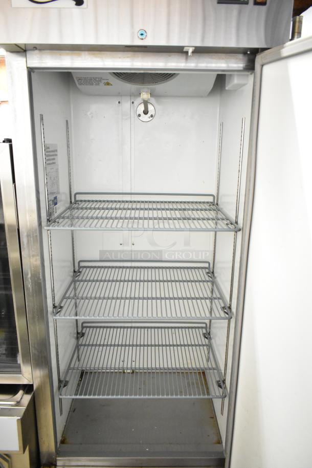 2022 Avantco 178A19FHC commercial single door reach-in freezer, 115V, used condition, interior shelving visible.