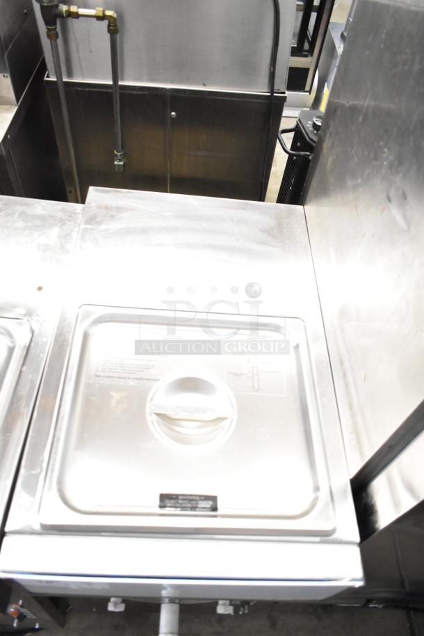 Frosty Factory 232W commercial frozen cocktail machine, stainless steel, 208/230V, 1 Phase, visible panel for operation settings.