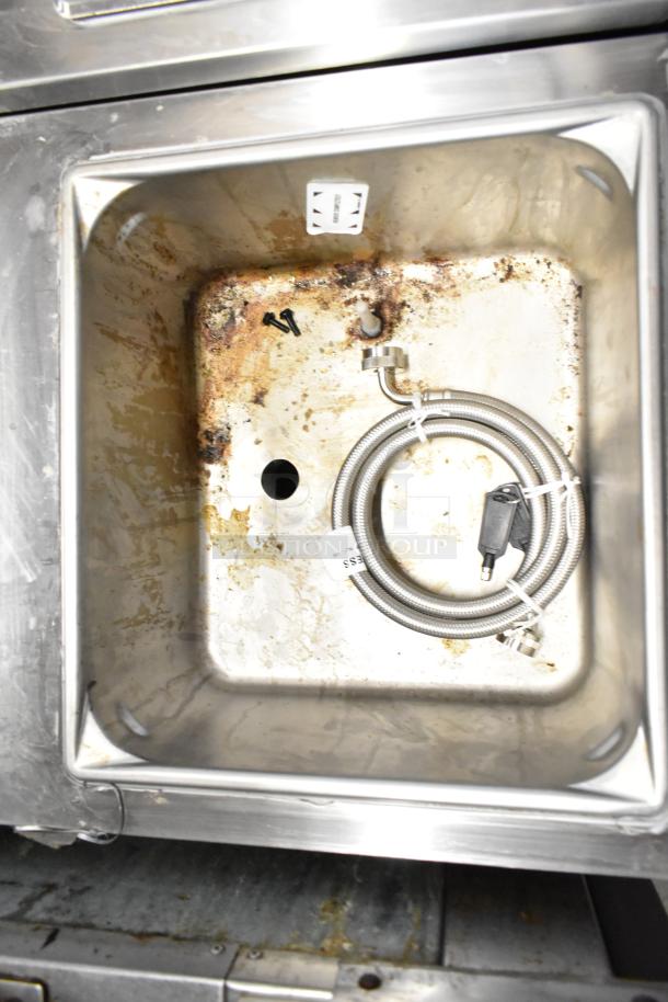 Frosty Factory 232W Commercial Frozen Cocktail Machine interior showing surface stains, wiring, and tubing; 208/230V, 1 Phase.