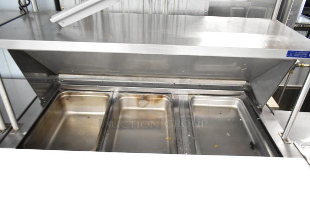 Cooltech CTR-48BMB sandwich salad prep table with bain marie, dual-tier shelf, visible wear, on commercial casters, 115V.