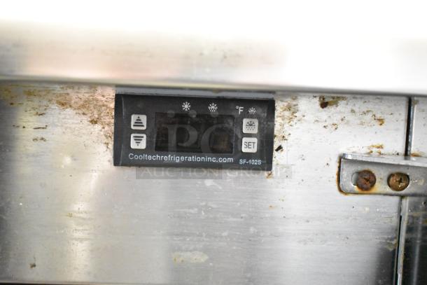 Cooltech CTR-48BMB digital display with temperature controls. Visible wear and online branding. Model SF-102S marked.