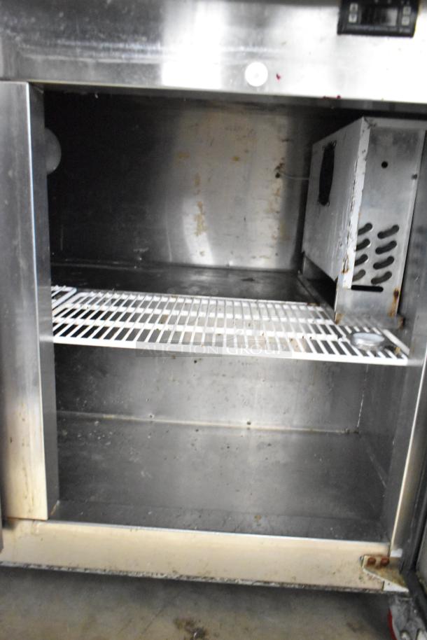 Cooltech CTR-48LBB commercial cooler, 2-door, with 2-tier over shelf, on casters. Condition shows use. 115V, 1 phase.