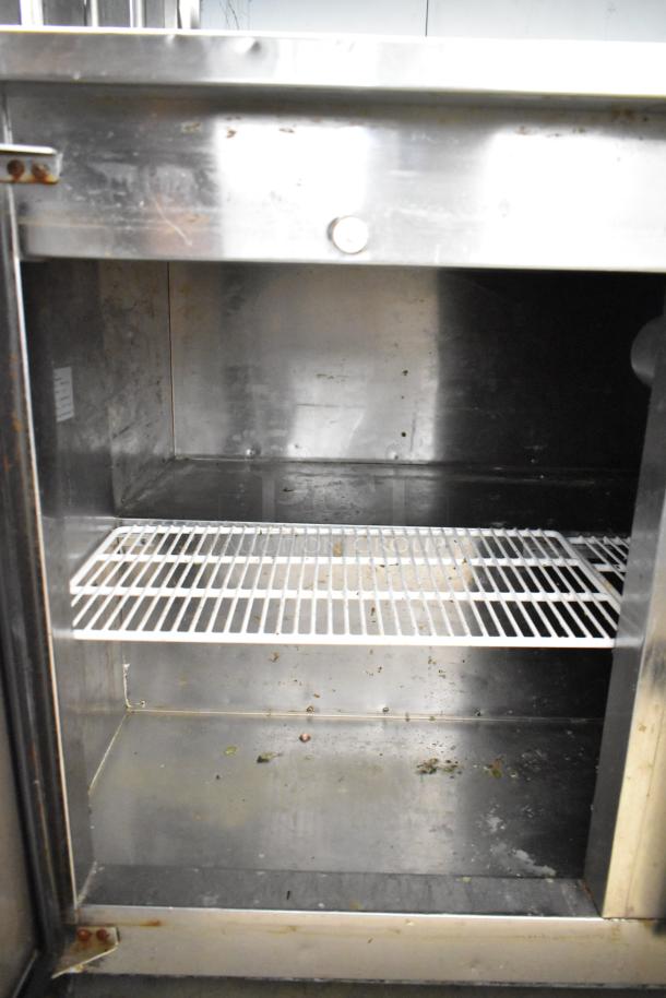 Cooltech CTR-48LBB commercial 2 door cooler with 2-tier over shelf, on casters. 115V, 1 phase. Some wear visible.