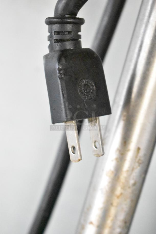 Power plug detail of Cooltech CTR-48LBB commercial 2-door cooler with 2-tier over shelf on commercial casters, 115 volts.