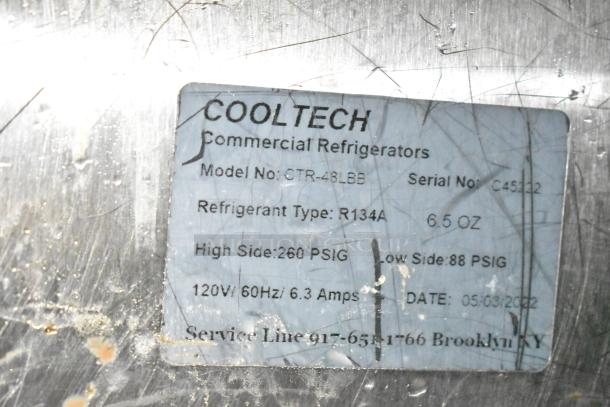 Cooltech CTR-48LBB cooler label; indicates model, refrigerant R134A, and specifications. Used in commercial settings.