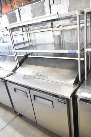 Cooltech CTR-48BMB commercial prep table, stainless steel, with 2-tier shelf, on casters, 115V, used condition, visible logo.