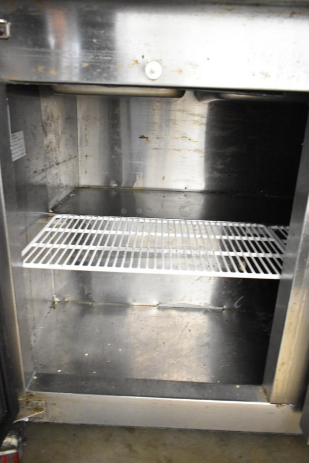 Cooltech CTR-48BMB commercial prep table interior view, showing shelving and space. Stainless steel, ideal for salad prep.