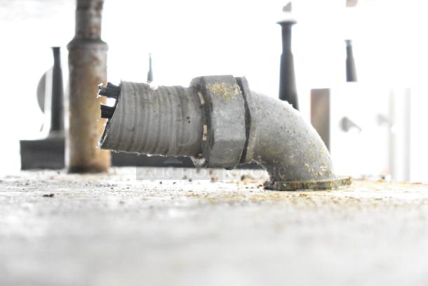 Image showing a close-up of a pipe component on the Groen EE-40 Commercial 40 Gallon Steam Kettle, detailing surface wear.