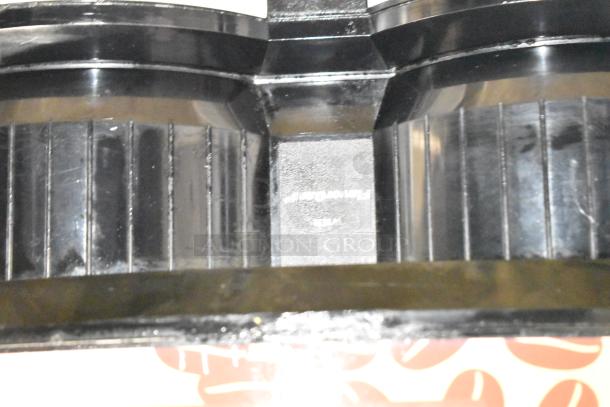 Bunn LCA-2 coffee dispenser, black, commercial use, 120 volts, 1 phase, visible markings, well-maintained condition.