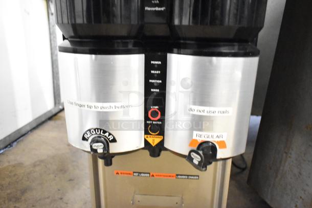 Bunn LCA-2 Commercial Liquid Coffee Dispenser, 120V, 1 Phase, dual nozzle, stainless steel, warning labels visible.