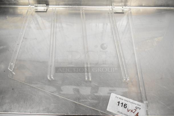 Clear poly tray with metal edges, item 116, in good condition. Auction label states quantity: 7 times your bid.