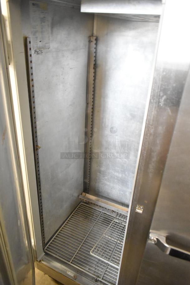 McCall 4-4045 Commercial 2 Door Reach-In Cooler, 115V, 1 Phase, empty interior with shelving details visible.